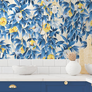 Disco Lemons wallpaper by Brand McKenzie in blue, lemon branches with disco balls behind bar stools