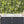 Disco Lemons wallpaper by Brand McKenzie in grey, lemon branches with disco balls behind bar stools