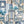 Downtown Deco wallpaper by Brand McKenzie in pale blue, detail of Art Deco skyscrapers