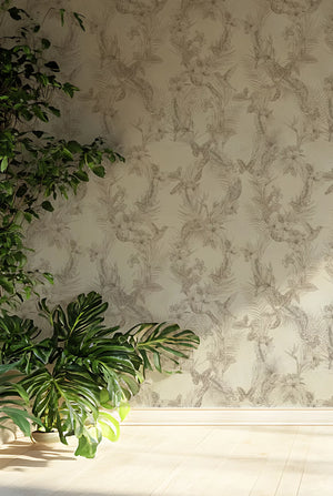 Eden wallpaper by Victoria Sanders in cream, birds among foliage on a feature wall