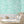 Elephant Breaststroke wallpaper by Brand McKenzie in aqua, swimming elephants in watercolour in a child's room