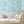 Elephant Breaststroke wallpaper by Brand McKenzie in blue, close view of swimming elephants in watercolour