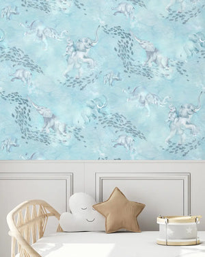 Elephant Breaststroke wallpaper by Brand McKenzie in blue, swimming elephants in watercolour in a nursery