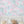 Elephant Breaststroke wallpaper by Brand McKenzie in pink, swimming elephants in watercolour in a child's room