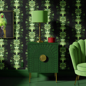 Emerald Elixir wallpaper by Liberty James Studio in black and green, mirrored art deco motifs above a sideboard