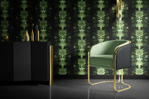 Emerald Elixir wallpaper by Liberty James Studio in black and green, mirrored art deco motifs behind a sofa in a living room