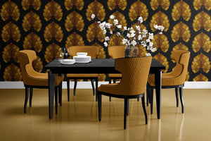 Empress Fan wallpaper by Liberty James Studio in gold, art deco fan leaves behind a dining table