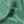 Esprit velvet by Tatie Lou in green, draped, showing an ornate medallion print