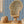 Esprit wallpaper by Tatie Lou in blue, an ornate medallion print in a living room