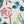 Eversley wallpaper by Parker and Jules in green and pink, pattern sample of trailing roses