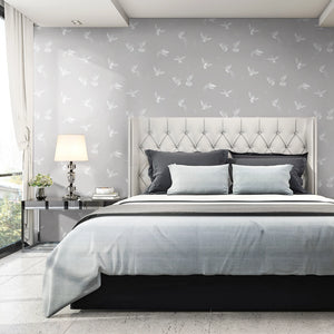 Exotic Birds wallpaper by Brand McKenzie in grey, hummingbirds in flight behind a bed