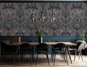 Exotica wallpaper by Victoria Sanders in petrol blue, jungle animals and tropical flowers behind a dining table