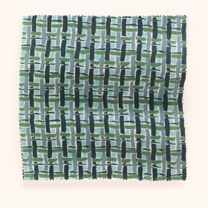 Basket linen by Parker and Jules in blue, draped, showing a woven basket check