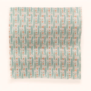Basket linen by Parker and Jules in mint green, in soft folds showing a woven basket check