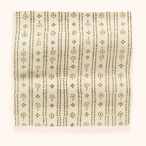 Birdlip linen by Parker and Jules in cream, in soft folds showing a small block-print stripe