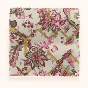 Creeping Trellis linen by Parker and Jules in cream and yellow, draped, showing flowers on a trellis