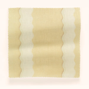 Double Scroll Stripe linen by Parker and Jules in cream, in soft folds showing wavy scroll stripes
