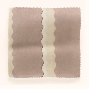 Double Scroll Stripe linen by Parker and Jules in lilac, draped, showing wavy scroll stripes