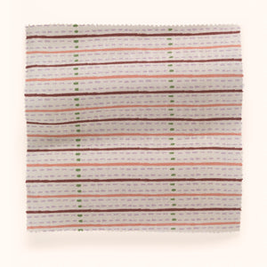 Eversley Stripe linen by Parker and Jules in beige, draped, showing a fine woven stripe