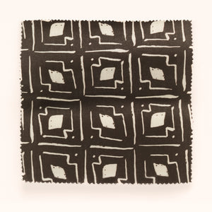 Lulu linen by Parker and Jules in brown, draped, showing a geometric square print