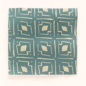 Lulu linen by Parker and Jules in blue, draped close-up of a geometric square print