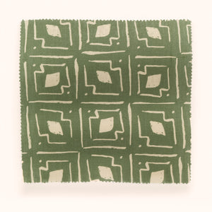 Lulu linen by Parker and Jules in dark green, in soft folds showing a geometric square print