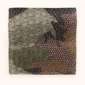 Ordnance Survey linen linen by Parker and Jules in purple, in soft folds showing a map-style camouflage print