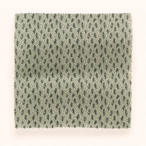 Trees II linen by Parker and Jules in sage green, in soft folds showing tiny stylised trees