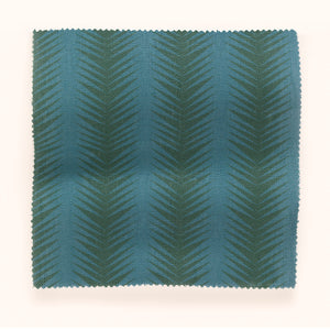 Ziggy linen by Parker and Jules in teal, draped, showing a chevron zigzag weave