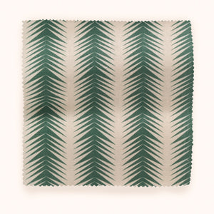 Ziggy linen by Parker and Jules in white and green, draped close-up of a chevron zigzag weave