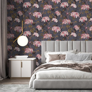 Feather Palm wallpaper by Brand McKenzie in charcoal, peony blossoms and palms in a bedroom