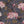 Feather Palm wallpaper by Brand McKenzie in charcoal, detail of peony blossoms and palms