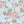 Feather Palm wallpaper by Brand McKenzie in blue, close-up of peony blossoms and palms