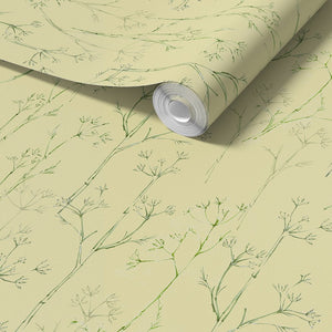 Sweet Herb Fennel wallpaper by Seed Home Designs in yellow, partly unrolled roll showing delicate fennel stems