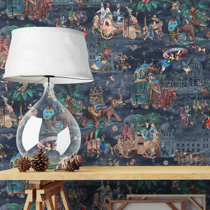 Fiesta wallpaper by Brand McKenzie in coral and navy, a festive procession of elephants above a cabinet