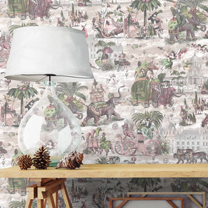 Fiesta wallpaper by Brand McKenzie in pink and green, a festive procession of elephants above a sideboard