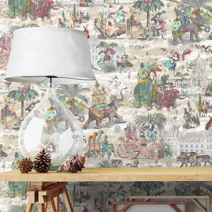 Fiesta wallpaper by Brand McKenzie in red and green, a festive procession of elephants above a sideboard