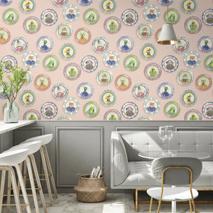 Fine China wallpaper by Brand McKenzie in pink, decorative china plates behind a dining table
