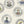Fine China wallpaper by Brand McKenzie in white, close view of decorative china plates
