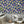 Fine China wallpaper by Brand McKenzie in blue, decorative china plates in a dining area