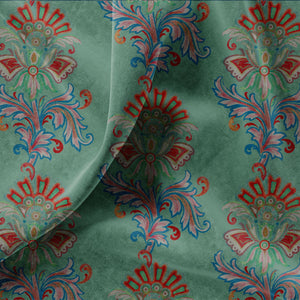 Fleur velvet by Tatie Lou in sage green, draped, showing stylised flower sprays
