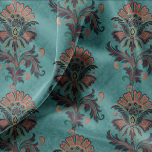Fleur velvet by Tatie Lou in teal, in soft folds showing stylised flower sprays