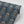 Fleur wallpaper by Tatie Lou in navy, sample roll showing stylised flower sprays