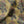 Fleur velvet by Tatie Lou in mustard, draped close-up of stylised flower sprays