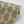 Fleur wallpaper by Tatie Lou in mustard, pattern sample of stylised flower sprays