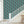 Fleur wallpaper by Tatie Lou in teal, stylised flower sprays in a hallway