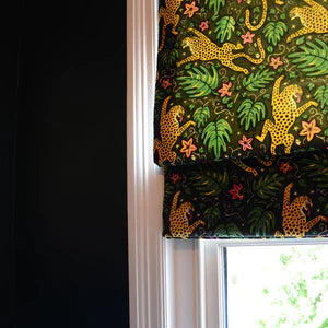 How the Leopard Got His Spots velvet by The Monkey Puzzle Tree in green and orange made into curtains