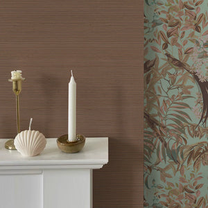 Brown Stone grasscloth grasscloth by Deus ex Gardenia in brown, a woven grasscloth texture above a sideboard