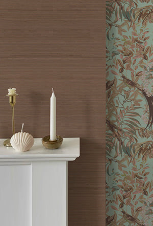 Brown Stone grasscloth grasscloth by Deus ex Gardenia in brown, a woven grasscloth texture above a sideboard