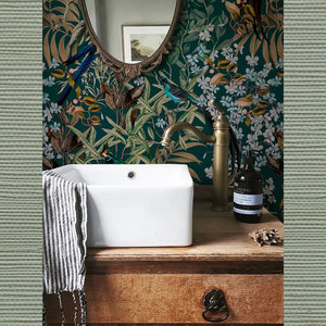 Earth Green grasscloth grasscloth by Deus ex Gardenia in sage green, a woven grasscloth texture in a bathroom
